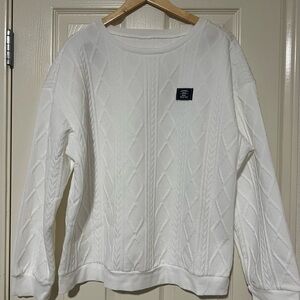 White Cable Knit Sweater and bottoms.